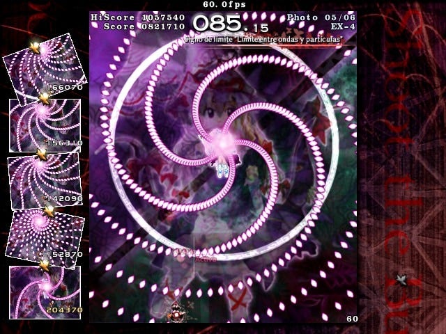 Gameplay screenshot, dodging bullets in a circle pattern and you can see photos to the left.